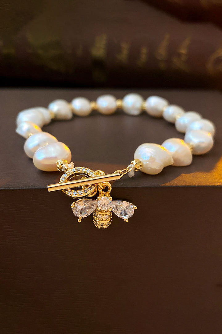 White Faux Baroque Pearl Bracelet with Rhinesone Bee Charm